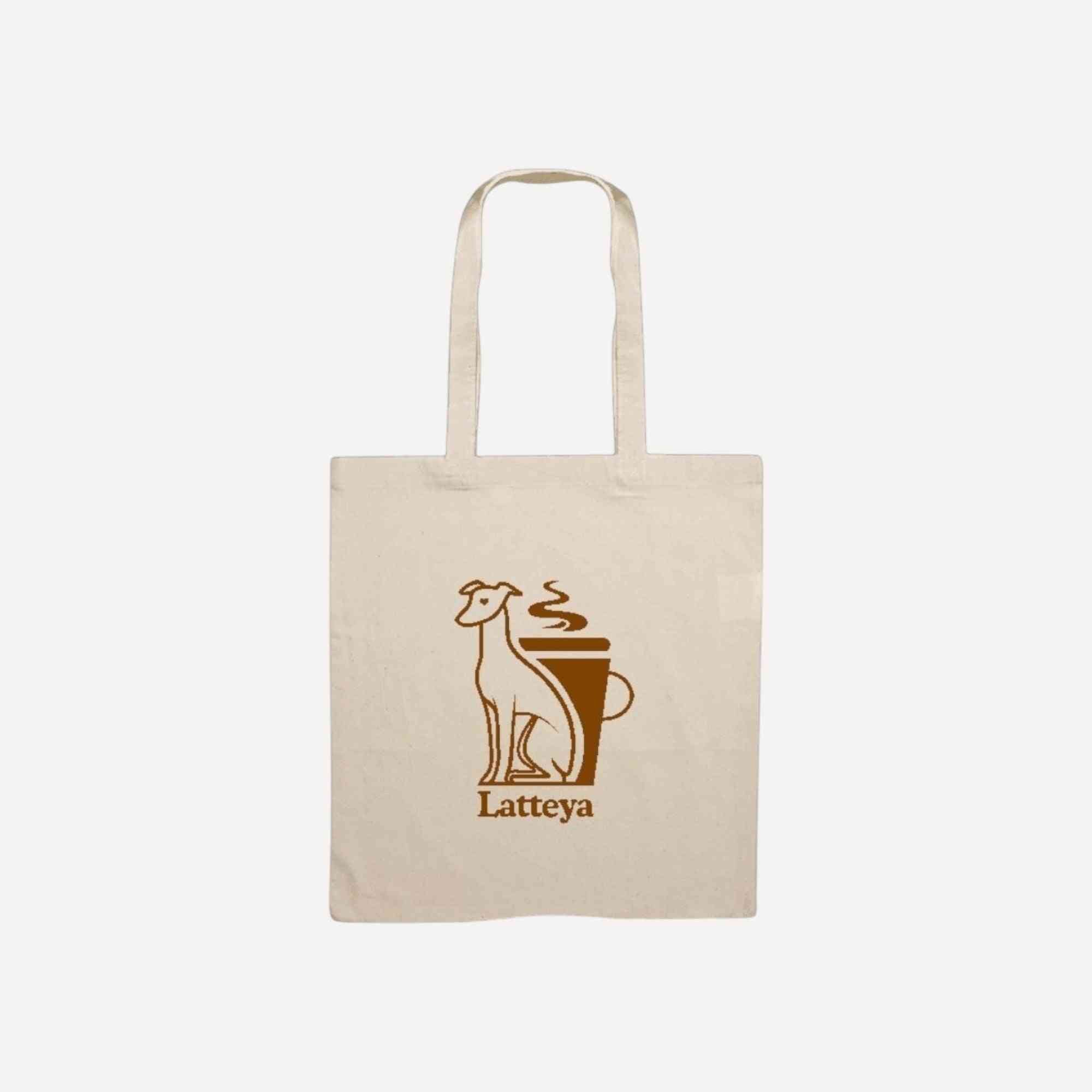 Tote Bag Latteya en coton naturel avec illustration d’un chien et d’un café, idéal pour les sorties avec ton chien. Accessoire pratique et stylé.